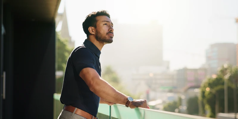 liberty environment man standing balcony railing enviroment